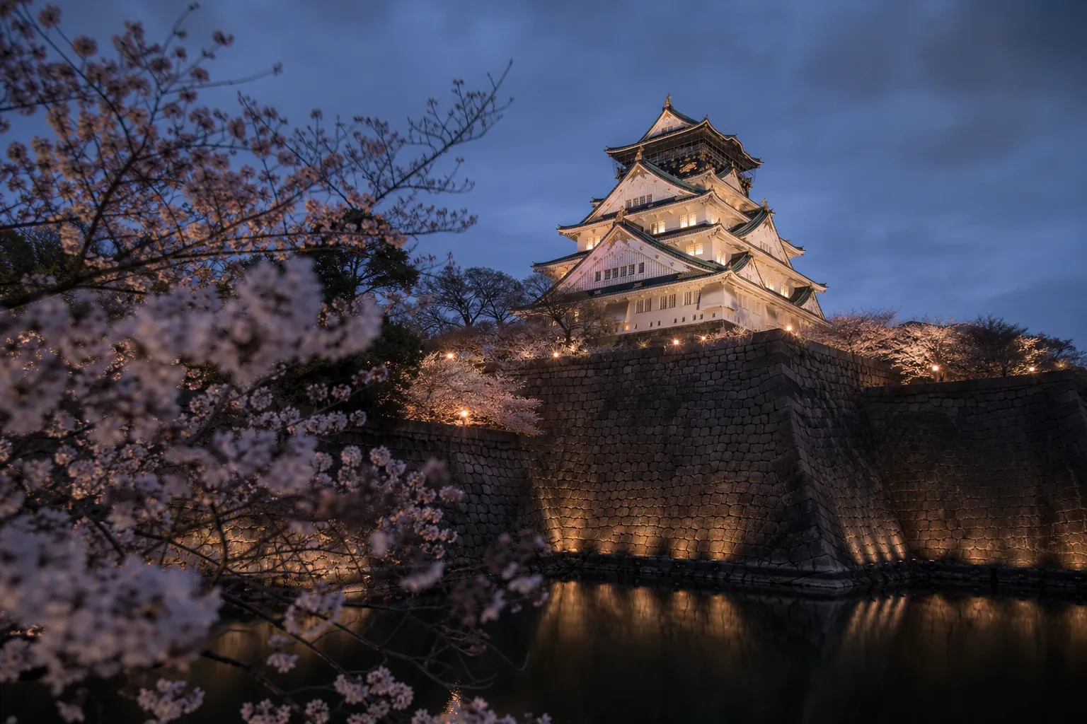 Osaka Castle keep and surrounding park on a clear day