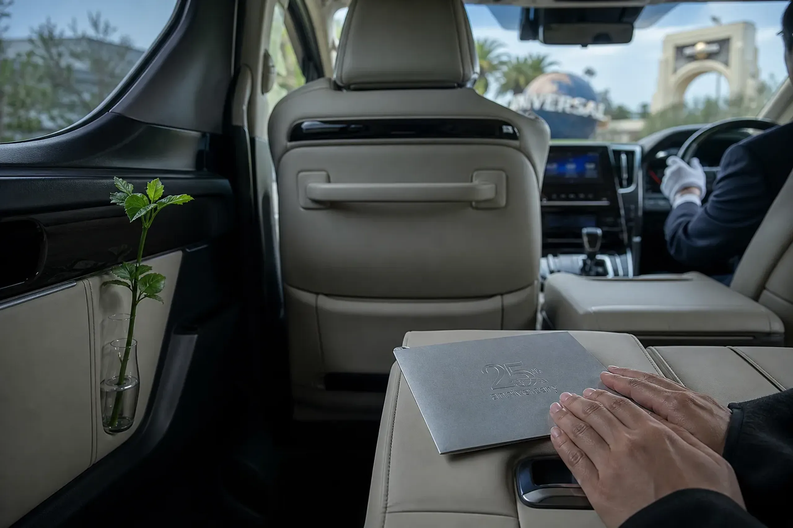 Luxury chauffeured minivan interior for a private USJ arrival in Osaka