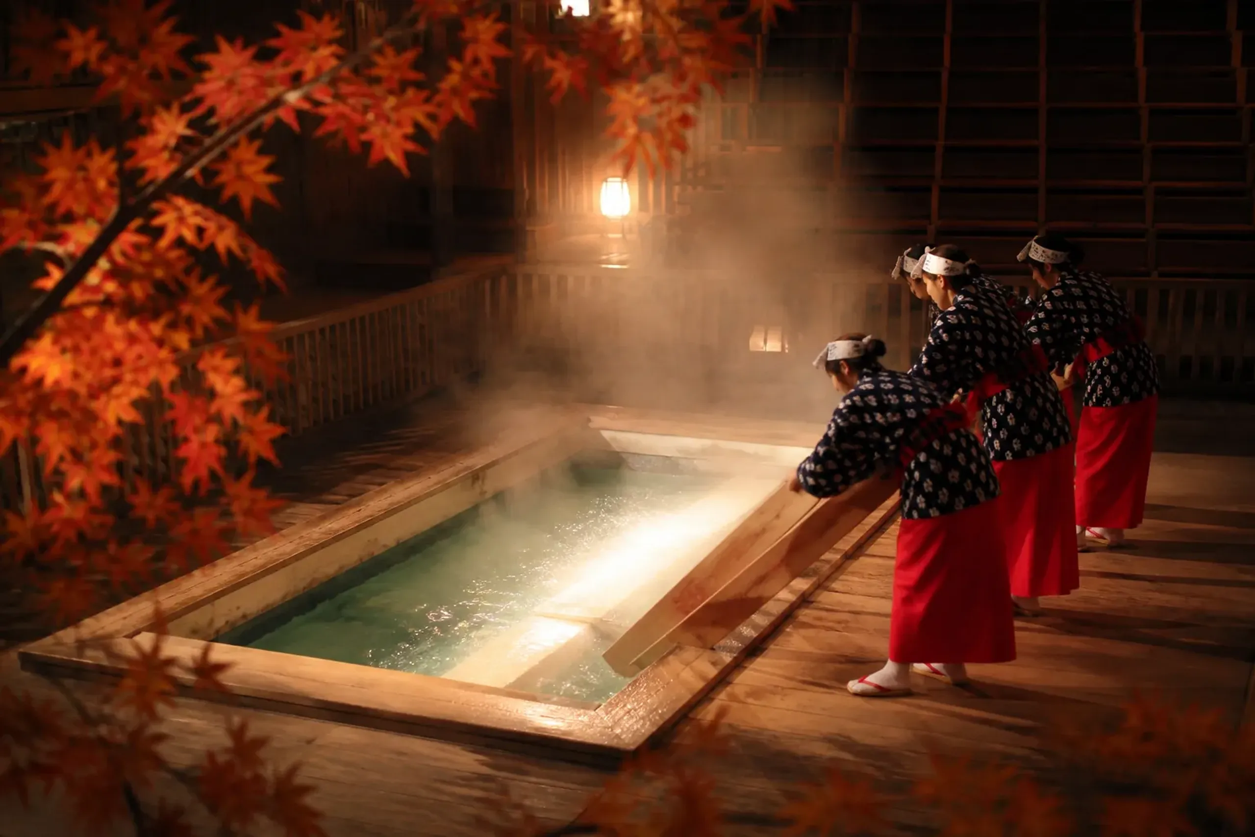 Performers demonstrating yumomi with wooden paddles at Netsunoyu beside the Yubatake in Kusatsu