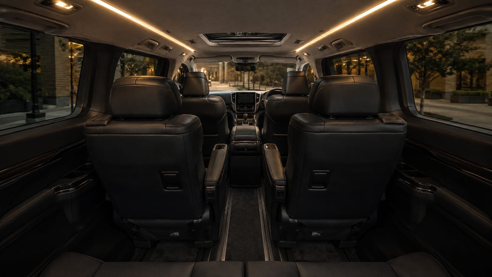 Toyota Alphard cabin looking forward over the captain's chairs from the rear bench
