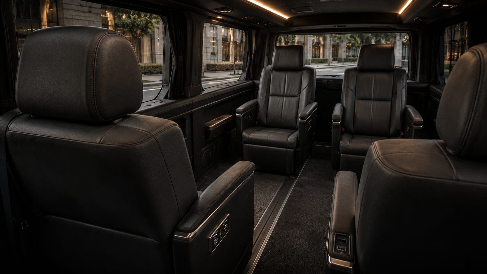 Toyota GranAce Premium independent armchairs either side of the centre aisle