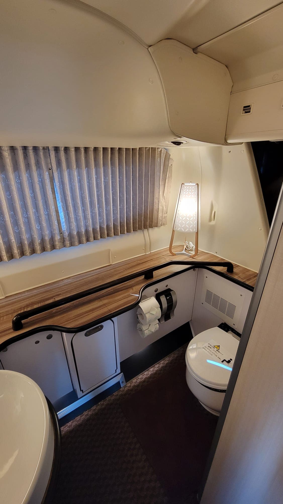 The onboard restroom on the Grand Class Coach