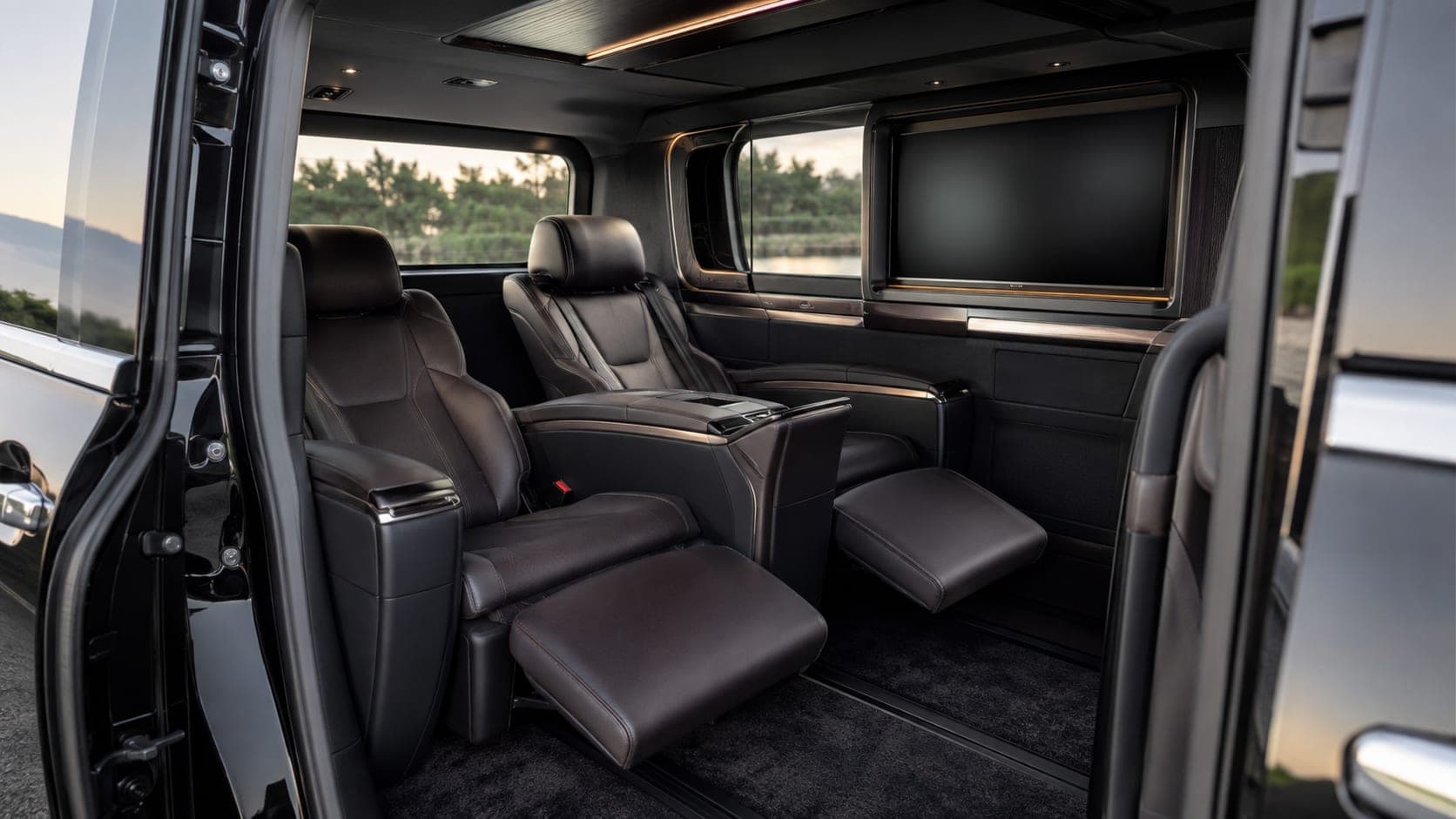 Interior view of the Toyota Luxury Hi-Ace lounge seating