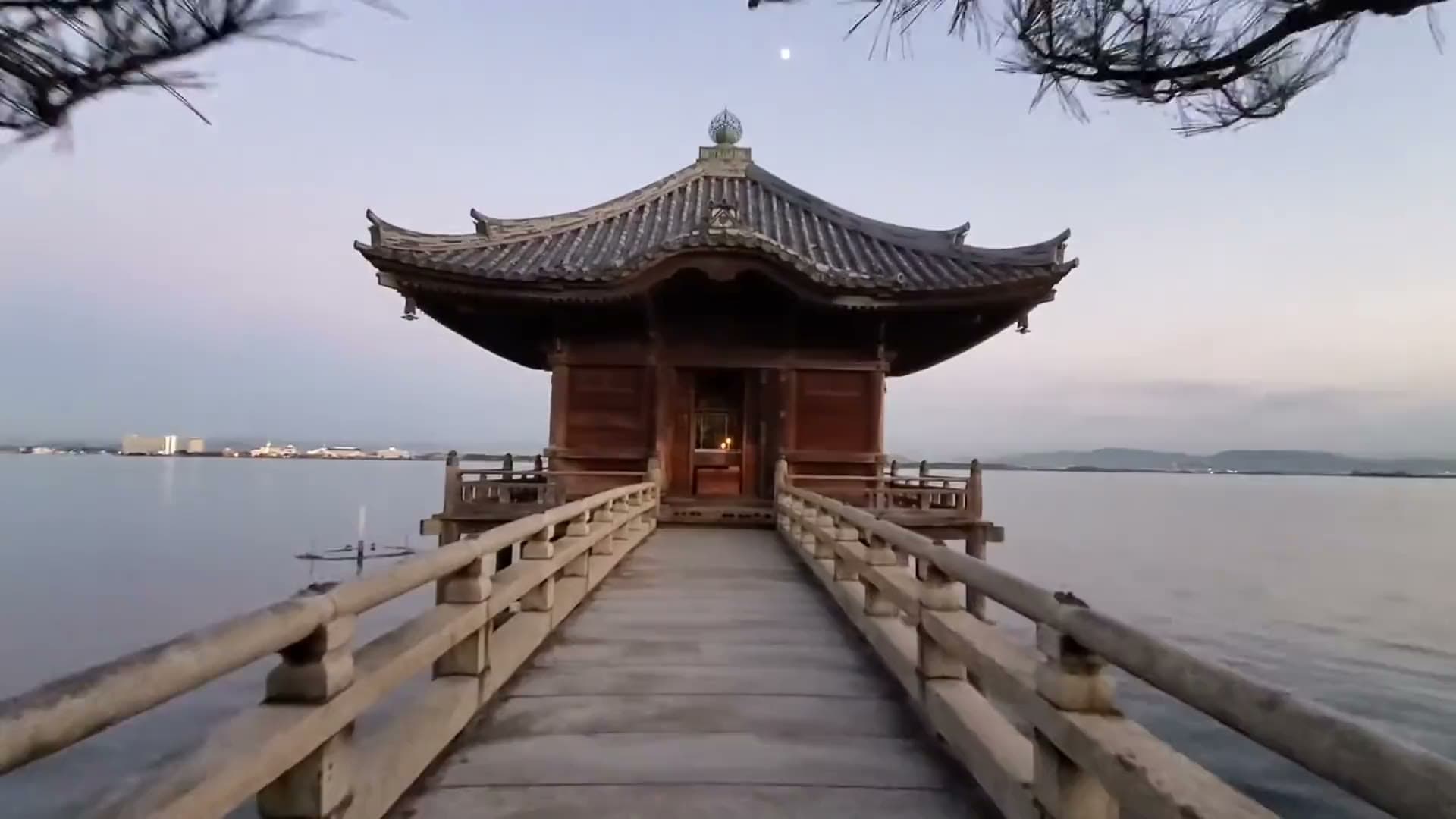 A lakeside temple at first light