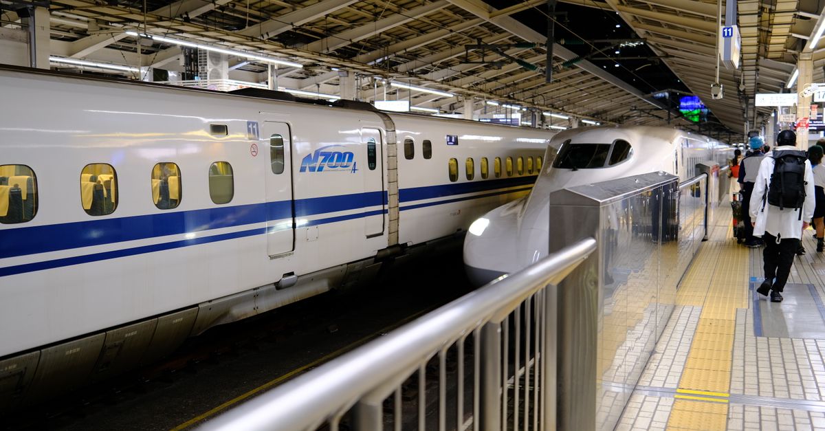 Tokaido Shinkansen train stopped at a platform, representing travel connections from Tokyo